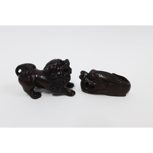 404 - A collection of five wooden netsukes to include a fish, rat, fist and a lion, etc  longest 6cm (5)