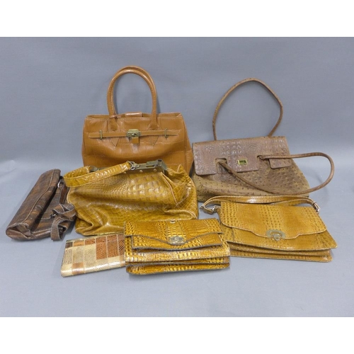 416 - A collection of faux animal skin handbags, a vintage suitcase and a tapestry style Gladstone bag, (a... 