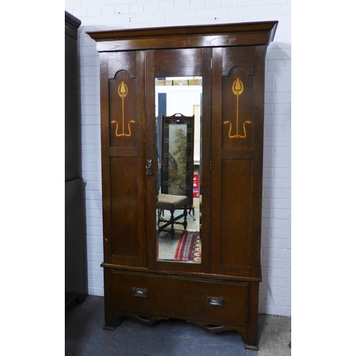 400 - Early 20th century wardrobe with inlaid tulip motifs and a central mirrored door