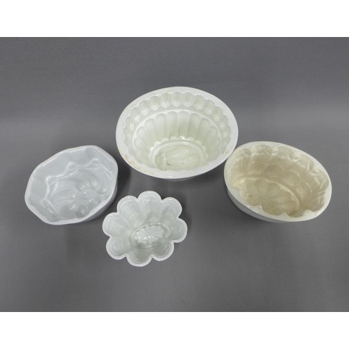 102 - Four various pottery jelly moulds to include Copeland and Shelley, tallest 16cm (4)