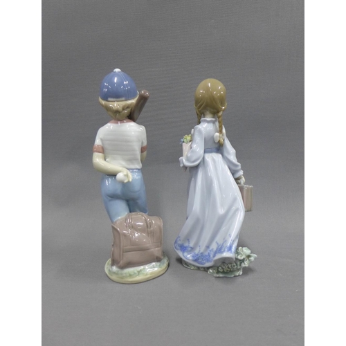 107 - Two Lladro Collector's Society figures to include a boy with a baseball bat and a  girl with flowers... 