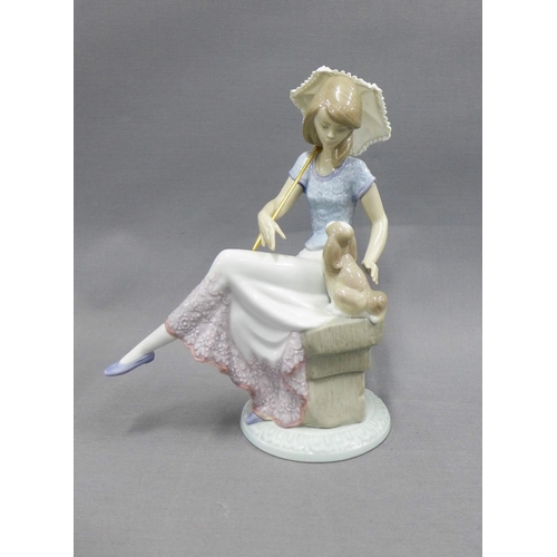 113 - Lladro Collector's Society figure of a girl with an umbrella and her dog,  22cm