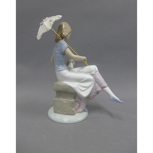 113 - Lladro Collector's Society figure of a girl with an umbrella and her dog,  22cm