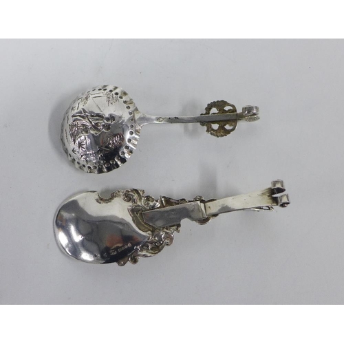 65 - Two Continental silver caddy spoons, one with Chester silver import marks, longest 13cm (2)