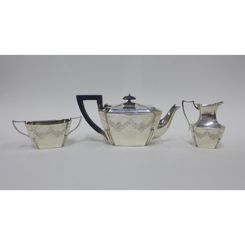 67 - Victorian silver teaset, R&W Sorley, Glasgow 1895, with bright cut floral pattern, in original fitte... 