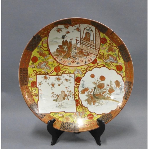 79 - Late 19th / early 20th century Japanese earthenware charger, painted with figures and other motifs a... 