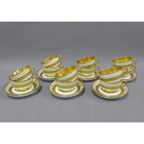 92 - Coalport porcelain teaset,  twelve place setting, with gilded bands and leaf trail pattern, retailed... 