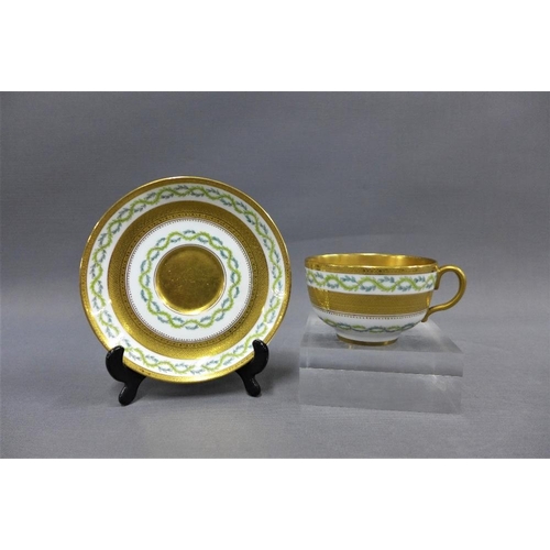 92 - Coalport porcelain teaset,  twelve place setting, with gilded bands and leaf trail pattern, retailed... 