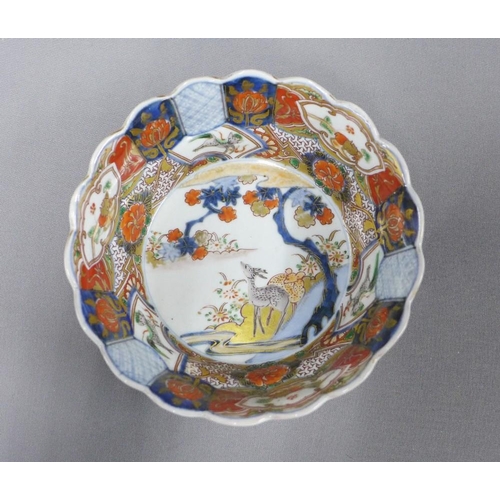 93 - Collection of Imari patterned pottery to include scalloped edge bowls and plates, largest 28cm diame... 