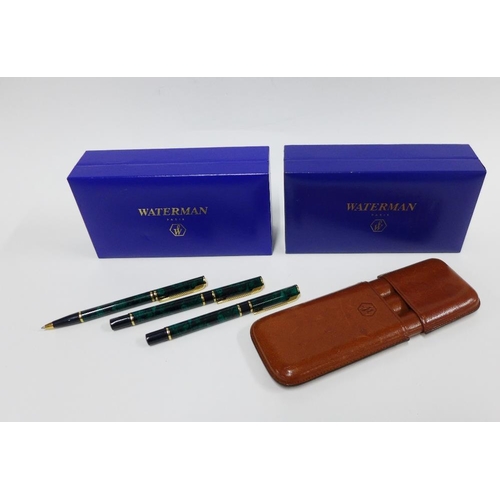 361 - Waterman leather cased set comprising a fountain pen, and two ballpoint pens and a brown leather cas... 