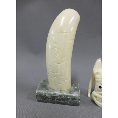 388 - Two marine ivory carvings and a replica Scrimshaw, 15cm long (3)