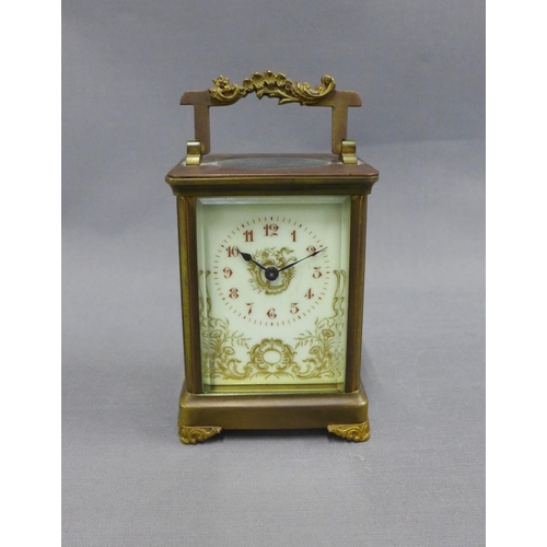 390 - French brass cased carriage clock, the dial with Roman numerals and floral pattern, 15cm including h... 