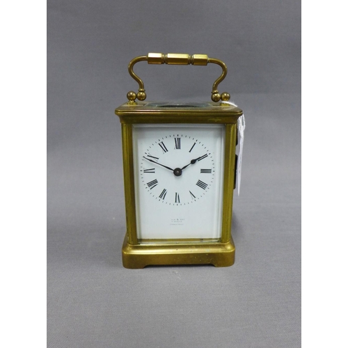 392 - French carriage clock, brass cased with glass panels, enamel dial with Roman numerals height includi... 