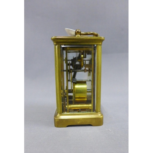 392 - French carriage clock, brass cased with glass panels, enamel dial with Roman numerals height includi... 