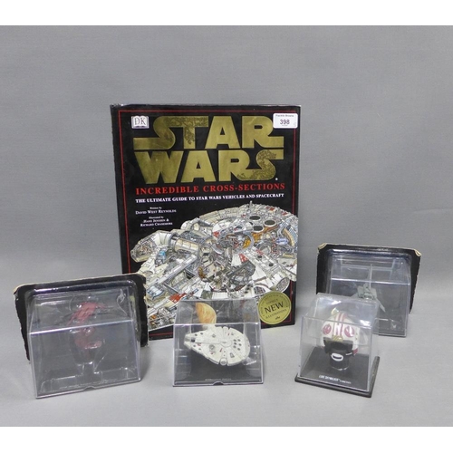 398 - Star Wars hardback collectors book and four boxed  models to include Millennium Falcon, STAP, Imperi... 