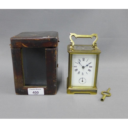 400 - Brass cased carriage alarm clock with leather carry case 15cm including handle