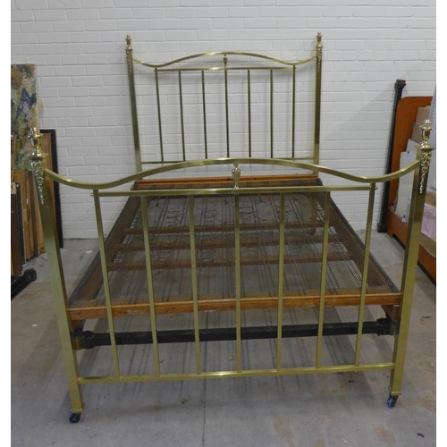 406 - Staples brass bed, double, with sprung base and side rails, no mattress, 164 x 142 x 215cm