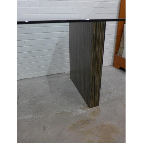 407 - Contemporary glass topped desk / table with faux zebra wood platform legs 174 x 78 x 110cm