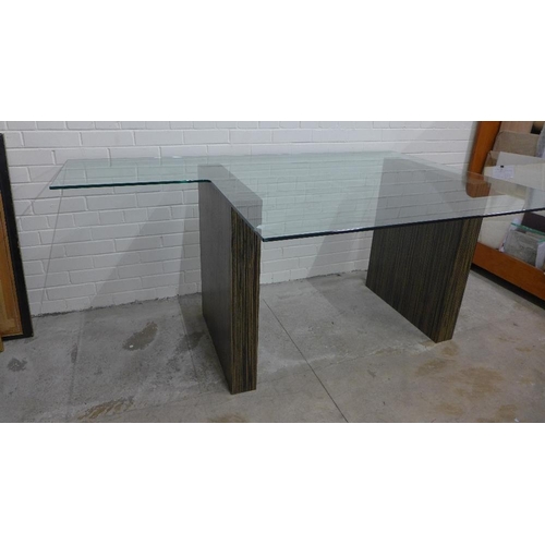 407 - Contemporary glass topped desk / table with faux zebra wood platform legs 174 x 78 x 110cm