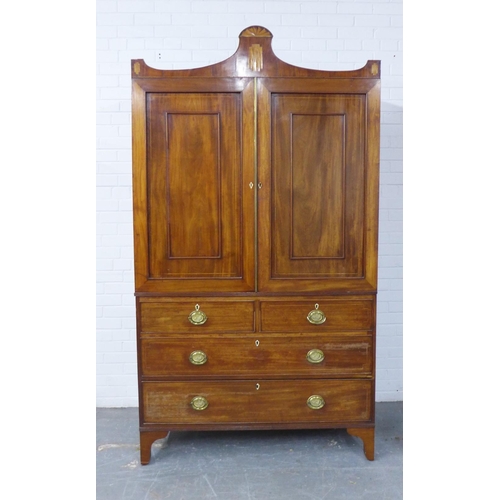 410 - Early 19th century mahogany inlaid linen press, the shaped cornice with a central fan motif and inla... 