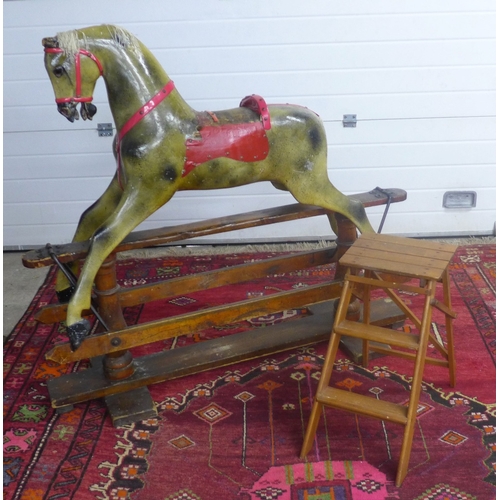 422 - Edwardian rocking horse on stand, circa 1904, possibly by F.H Ayres & Co, with a painted body, some ... 