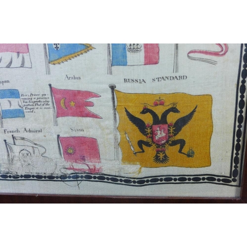 67 - A large silk panel with Flags of World centred by a Royal Standard of the United Kingdom,  framed un... 