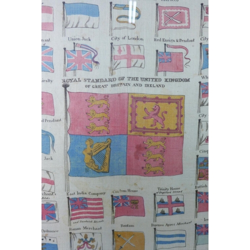 67 - A large silk panel with Flags of World centred by a Royal Standard of the United Kingdom,  framed un... 