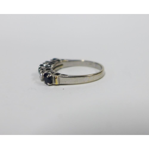 19 - Five stone diamond and sapphire dress ring, the stones claw set to a white metal band, UK ring size ... 