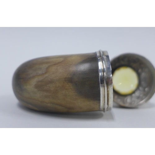 27 - Scottish curly horn snuff mull with white metal mounts, the hinged lid inset with a citrine coloured... 
