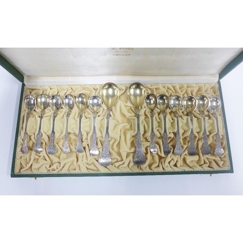 33 - Marius Hammer cased set of silver gilt spoons, comprising twelve glace spoons and two serving spoons... 