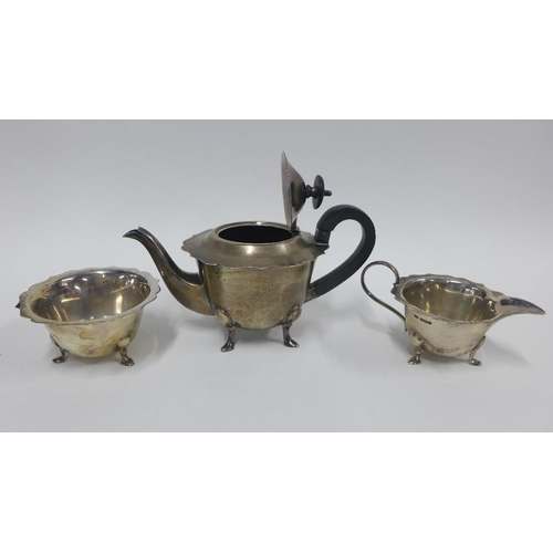 48 - George V silver three piece teaset, Viners, Sheffield 1921, together with silver sugar nips (4)