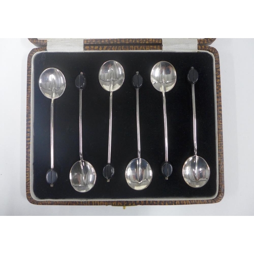 57 - Cased set of six Birmingham silver teaspoons with sugar tongs and a cased set of six silver coffee b... 