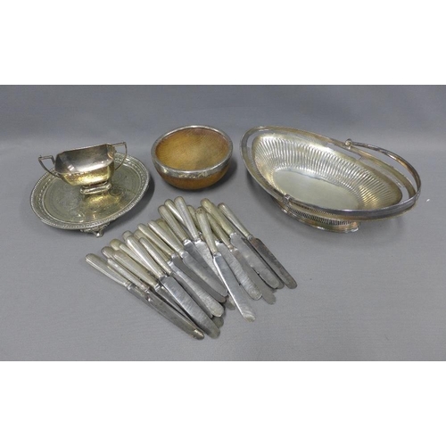 62 - White metal swing handled basket, Epns tray, flatware, sugar bowl and a silver mounted wooden bowl (... 