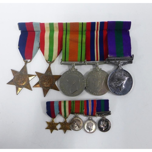 66 - WWII medal group comprising Defence and War medals, 1939 - 1945 Star and the Italy Star medal togeth... 