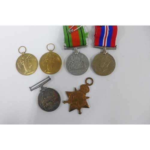 67 - WWI medal trio awarded to 278848 Sapr. A. Sinclair RE. and a dog tag, another WWI Victory medal and ... 