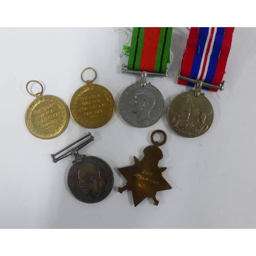 67 - WWI medal trio awarded to 278848 Sapr. A. Sinclair RE. and a dog tag, another WWI Victory medal and ... 