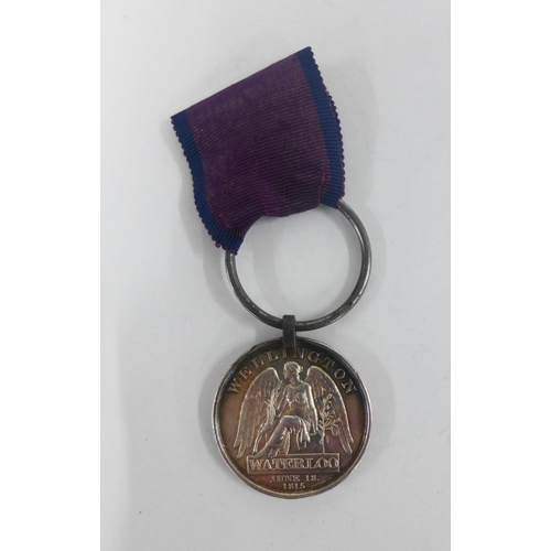 72 - The Waterloo Medal, awarded to PETER GUNN, 1ST BAT. 92ND HIGHLANDERS, with steel ring and ribbon