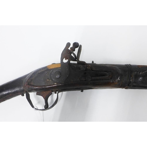 73 - Antique flintlock pistol, 53 cm long (a/f)