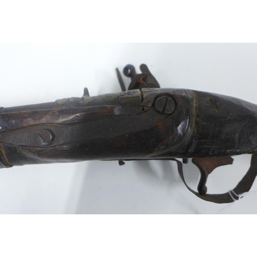 73 - Antique flintlock pistol, 53 cm long (a/f)