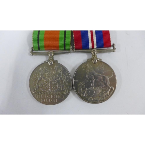 80 - WWII Defence and War medals and two portrait miniatures within  gilt metal frames, largest 11 x 8cm ... 