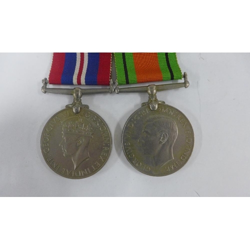 80 - WWII Defence and War medals and two portrait miniatures within  gilt metal frames, largest 11 x 8cm ... 