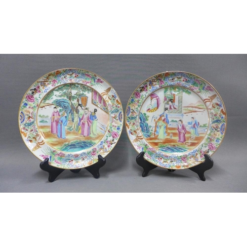 85 - Two Chinese famille rose plates, painted with figures and stylised motifs, 27cm diameter (2)