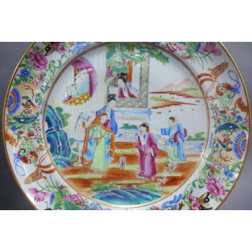 85 - Two Chinese famille rose plates, painted with figures and stylised motifs, 27cm diameter (2)