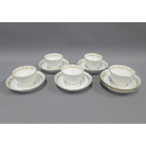 88 - Twelve Barr Worcester fluted tea bowls and saucers, white glazed with gilt rims and borders, (12)