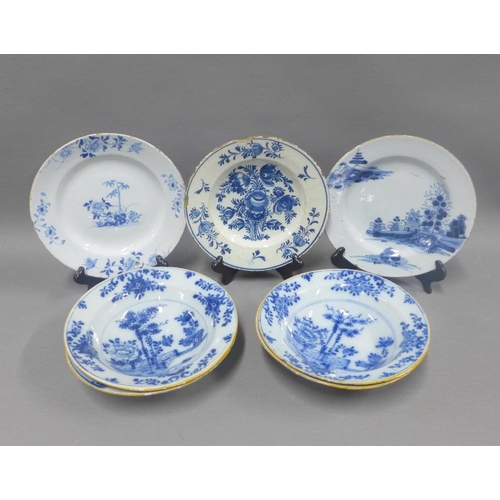 89 - Collection of tin glazed blue and white pottery to include a set of four bowls and three various pla... 