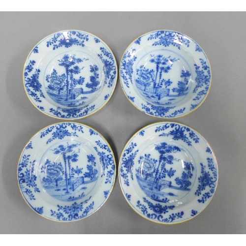 89 - Collection of tin glazed blue and white pottery to include a set of four bowls and three various pla... 