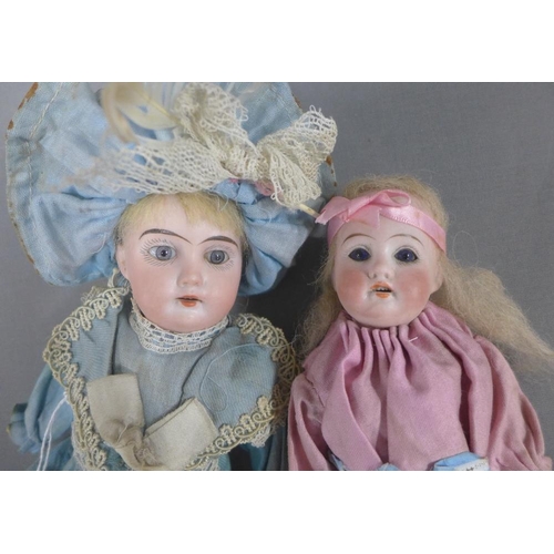 341 - Armand Marseille Duchess bisque head doll in her original clothing and shoes, 30cm, together with an... 