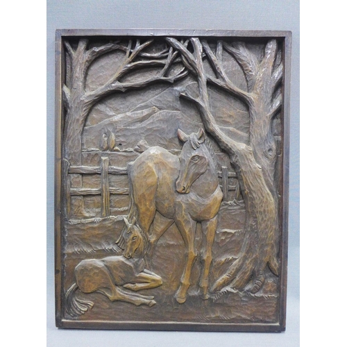 346 - A horse and foal carved wooden plaque, 35 x 28cm  together with a Whitefriars style green glass bowl... 