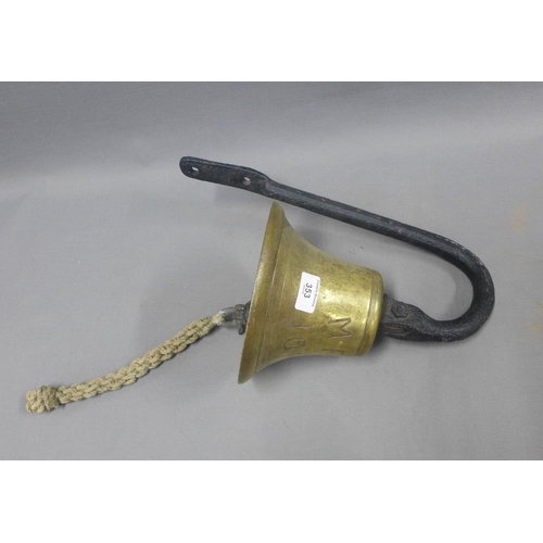 353 - Brass bell with an iron wall bracket, inscribed MFV 1016