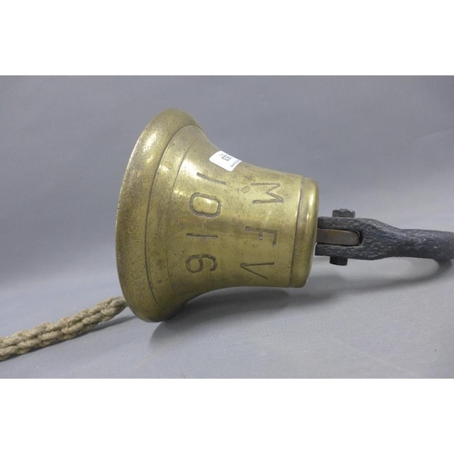 353 - Brass bell with an iron wall bracket, inscribed MFV 1016